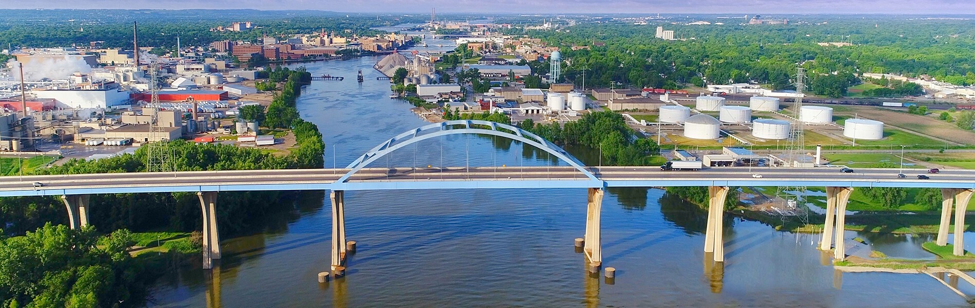 bridge going over waterway that connects a city